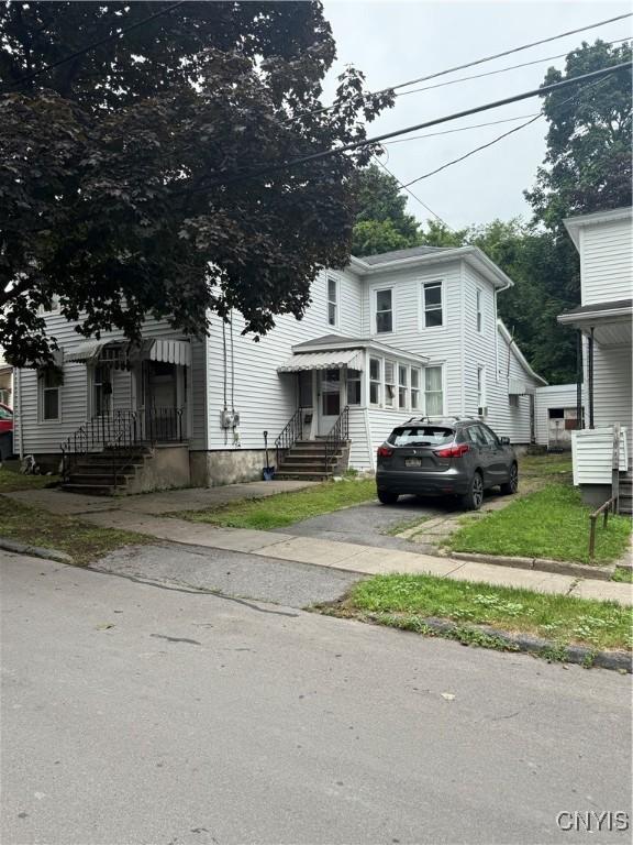 8 Spring St, Auburn, NY 13021 - view of front of property featuring asphalt driveway and entry steps