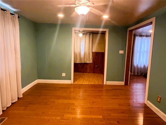 33 E Vanscoter St, Hornell, NY 14843 - empty room featuring wood finished floors, a ceiling fan, and recessed lighting