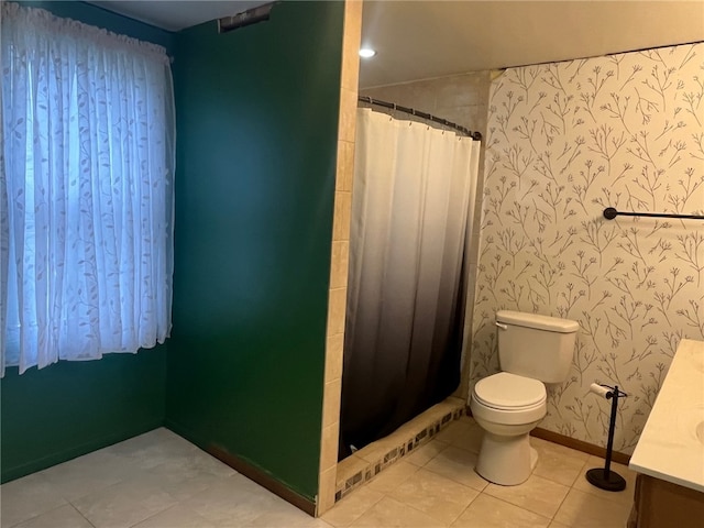 33 E Vanscoter St, Hornell, NY 14843 - full bath with vanity, tiled shower, wallpapered walls, and tile patterned flooring