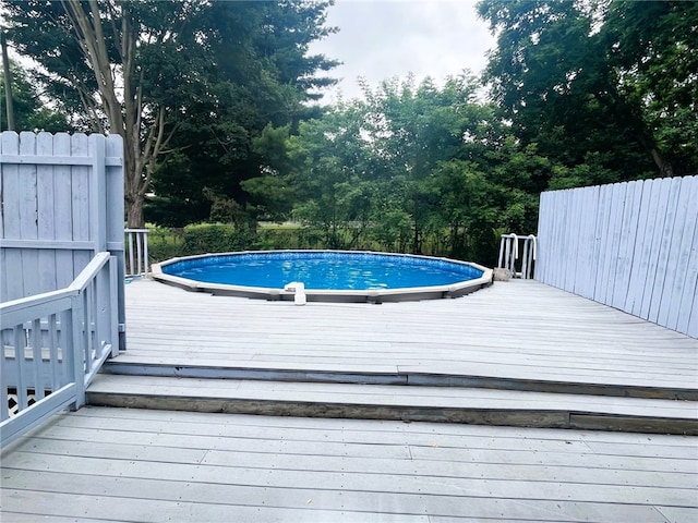 33 E Vanscoter St, Hornell, NY 14843 - outdoor pool with a deck and view of scattered trees