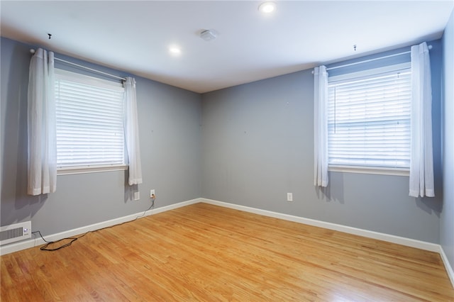 32 White Birch Cir, Chili, NY 14624 - unfurnished room featuring light wood-style floors, a smoke detector, and recessed lighting