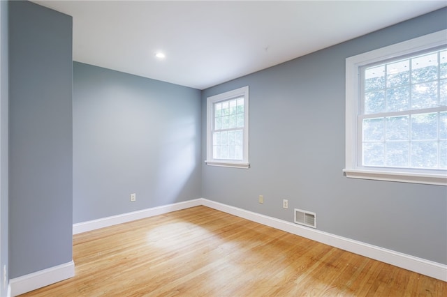 32 White Birch Cir, Chili, NY 14624 - spare room featuring light wood-style flooring and recessed lighting