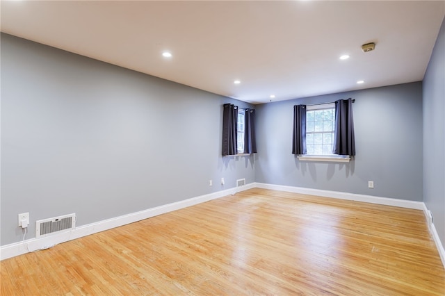 32 White Birch Cir, Chili, NY 14624 - unfurnished room featuring wood finished floors and recessed lighting