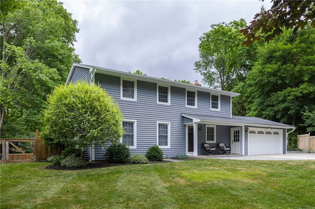 32 White Birch Cir, Chili, NY 14624 - colonial home featuring a chimney, a garage, and driveway