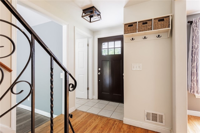 32 White Birch Cir, Chili, NY 14624 - entrance foyer featuring light wood-style flooring and stairs