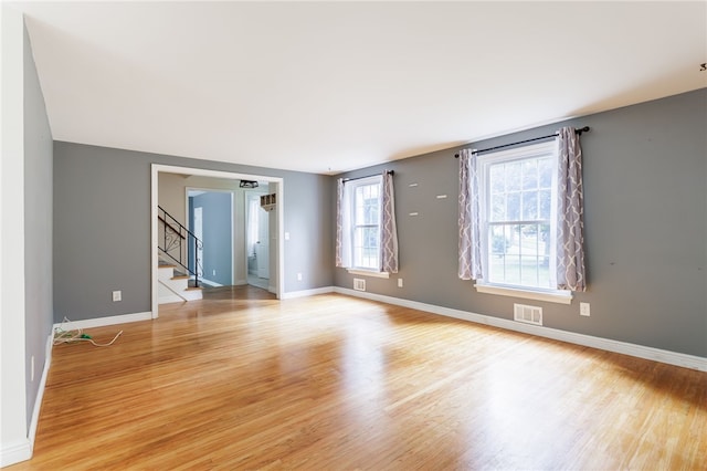 32 White Birch Cir, Chili, NY 14624 - spare room with stairs and light wood-type flooring