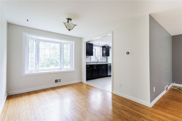 32 White Birch Cir, Chili, NY 14624 - unfurnished dining area featuring light wood-type flooring