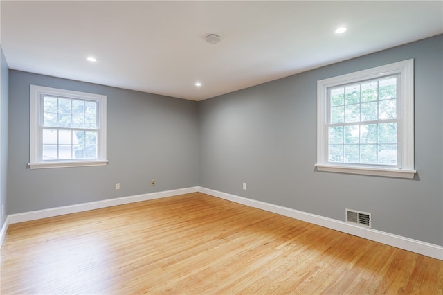32 White Birch Cir, Chili, NY 14624 - empty room with light wood finished floors and recessed lighting