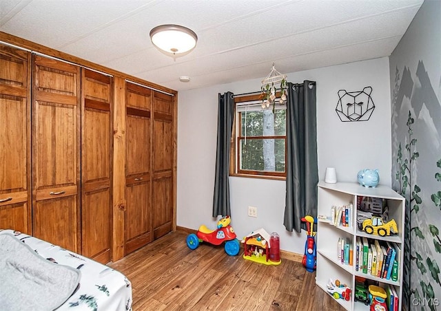 4022 W Milestrip Rd, Fenner, NY 13032 - bedroom featuring wood finished floors and baseboards