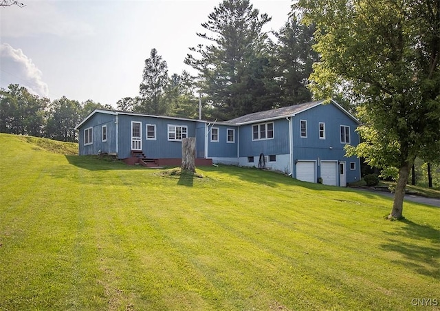 4022 W Milestrip Rd, Fenner, NY 13032 - view of front of home featuring a garage and a front lawn