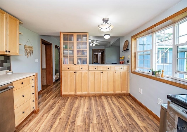 4022 W Milestrip Rd, Fenner, NY 13032 - kitchen featuring light brown cabinets, dishwasher, light wood-style floors, range, and light countertops