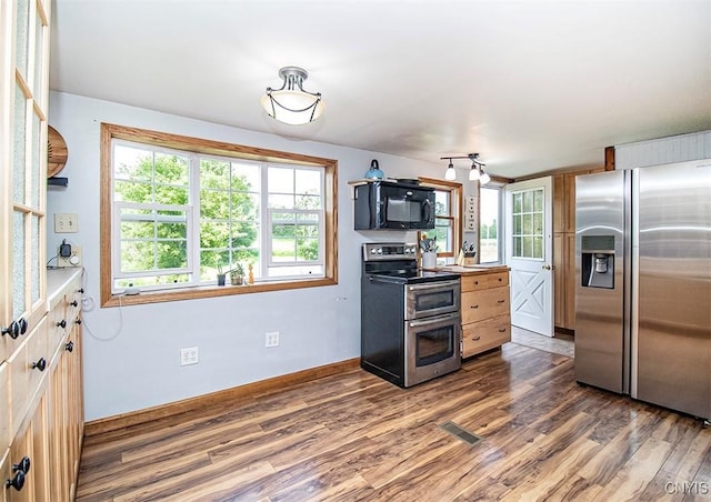 4022 W Milestrip Rd, Fenner, NY 13032 - kitchen with appliances with stainless steel finishes, dark wood-style floors, and light countertops