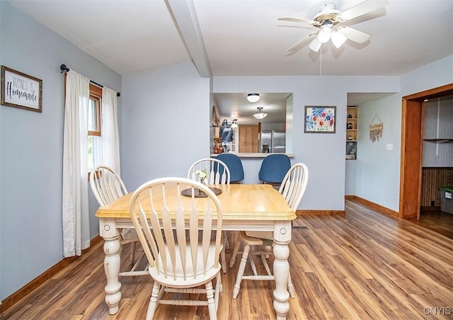 4022 W Milestrip Rd, Fenner, NY 13032 - dining room featuring wood finished floors and a ceiling fan