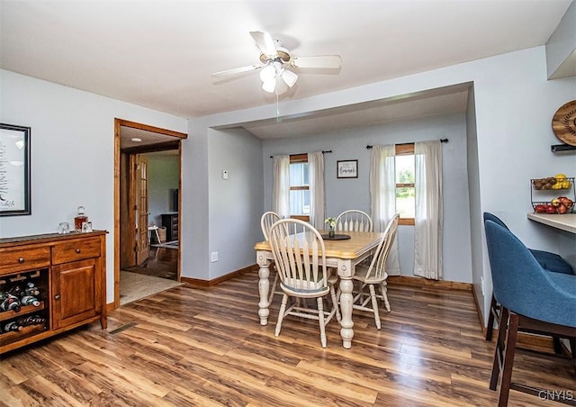 4022 W Milestrip Rd, Fenner, NY 13032 - dining room with wood finished floors and a ceiling fan