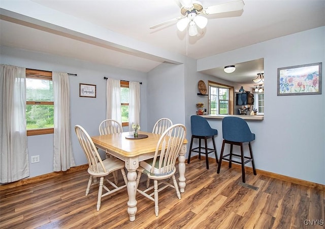 4022 W Milestrip Rd, Fenner, NY 13032 - dining area with wood finished floors, plenty of natural light, and ceiling fan