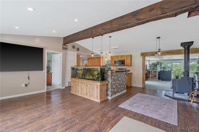 1037 County Route 17, Constantia, NY 13028 - kitchen featuring stainless steel microwave, a wood stove, a center island, dark wood-type flooring, and recessed lighting