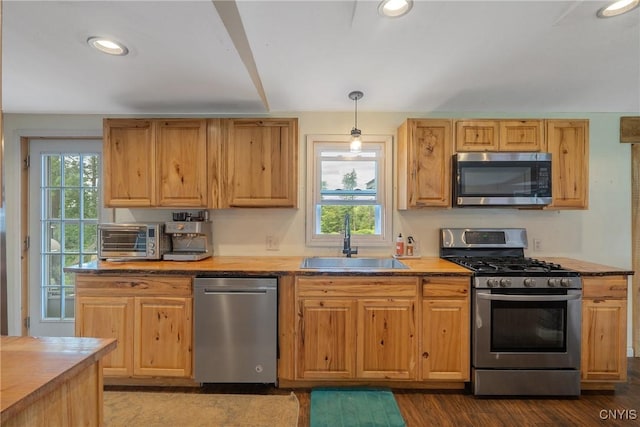 1037 County Route 17, Constantia, NY 13028 - kitchen featuring stainless steel appliances, plenty of natural light, dark wood finished floors, pendant lighting, and recessed lighting