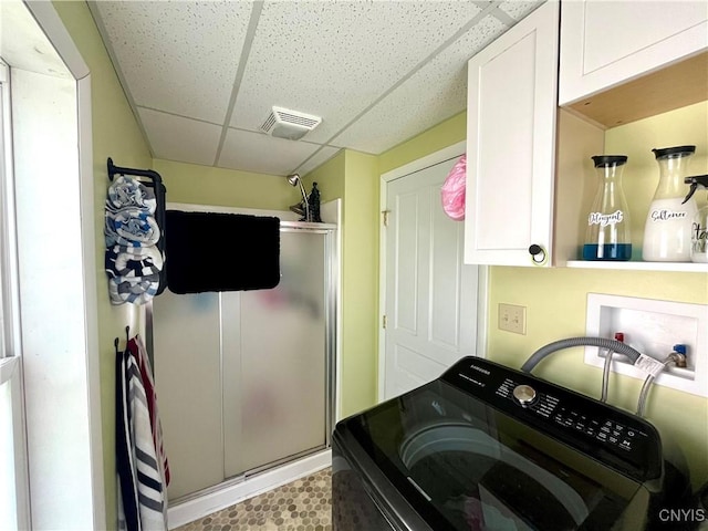 66 N Gordon St, Gouverneur, NY 13642 - laundry room with washer / dryer and cabinet space