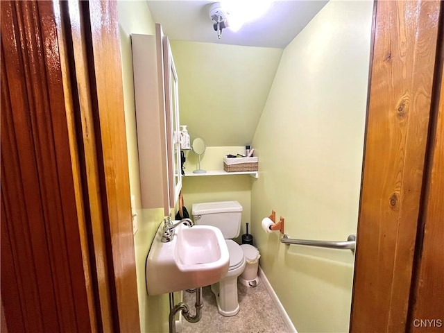 66 N Gordon St, Gouverneur, NY 13642 - bathroom with toilet and lofted ceiling