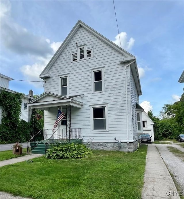 66 N Gordon St, Gouverneur, NY 13642 - view of front of home featuring a front yard