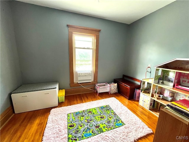 66 N Gordon St, Gouverneur, NY 13642 - rec room with wood finished floors and cooling unit