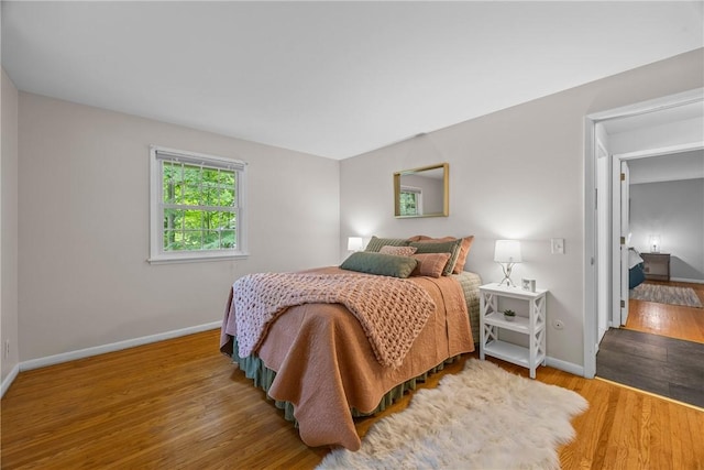 790 Oakridge Dr, Irondequoit, NY 14617 - bedroom with baseboards and wood finished floors