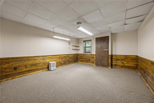790 Oakridge Dr, Irondequoit, NY 14617 - basement with wood walls, carpet flooring, a paneled ceiling, and wainscoting