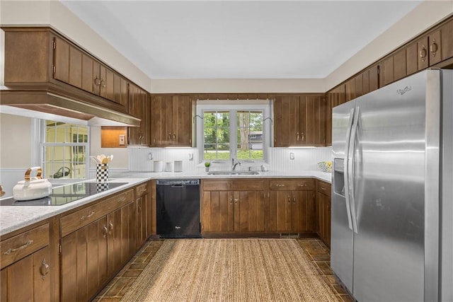 790 Oakridge Dr, Irondequoit, NY 14617 - kitchen with black appliances and light countertops