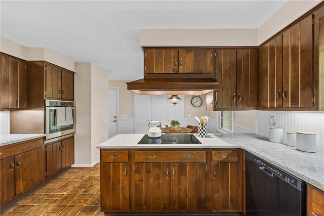 790 Oakridge Dr, Irondequoit, NY 14617 - kitchen featuring black appliances, extractor fan, light stone counters, and brick patterned flooring