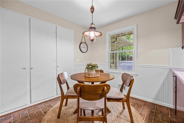 790 Oakridge Dr, Irondequoit, NY 14617 - dining space with a wainscoted wall