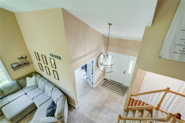 906 Lothario Cir, Webster, NY 14580 - stairway with baseboards and high vaulted ceiling