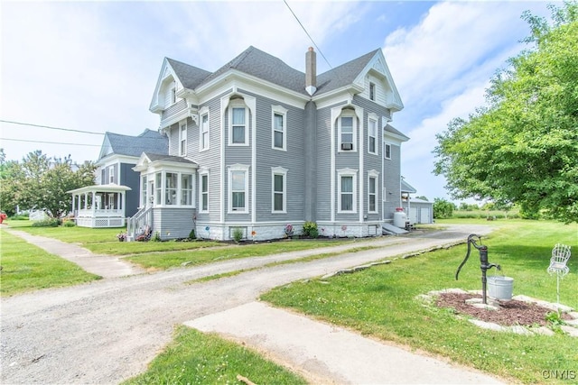 20199 County Route 181, Orleans, NY 13656 - view of front facade featuring a front yard and driveway