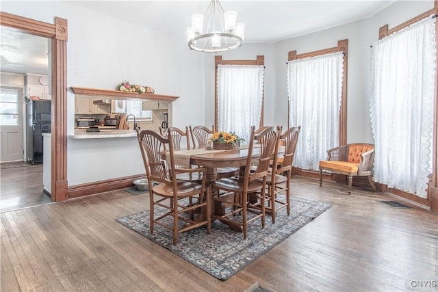 20199 County Route 181, Orleans, NY 13656 - dining room featuring a chandelier and wood-type flooring
