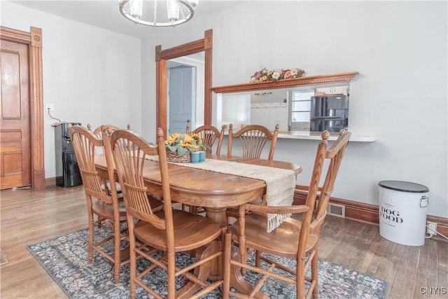 20199 County Route 181, Orleans, NY 13656 - dining room with a chandelier and wood finished floors