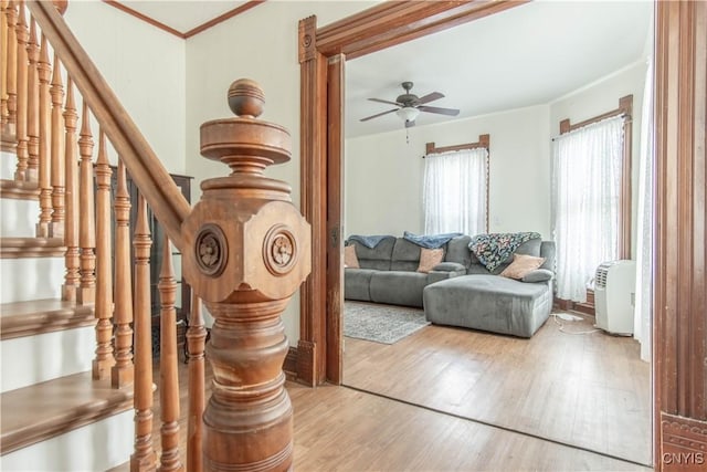 20199 County Route 181, Orleans, NY 13656 - stairs featuring wood finished floors, ornamental molding, and a ceiling fan