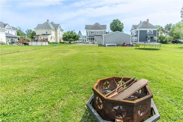 20199 County Route 181, Orleans, NY 13656 - view of grassy yard with a trampoline and a residential view