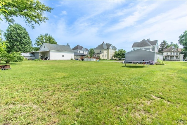 20199 County Route 181, Orleans, NY 13656 - view of green lawn with a trampoline