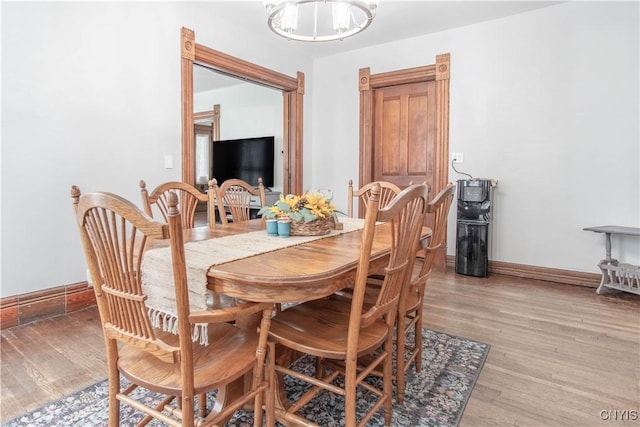 20199 County Route 181, Orleans, NY 13656 - dining area featuring light wood finished floors and a chandelier