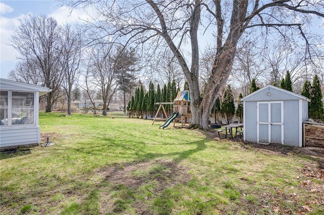 569 Marsh Rd, Pittsford, NY 14534 - view of yard with a storage unit, a playground, and a sunroom