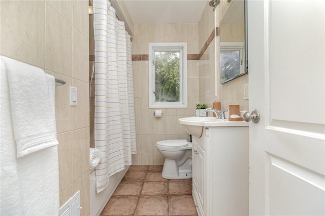 569 Marsh Rd, Pittsford, NY 14534 - full bathroom with tile walls, vanity, and a shower with curtain