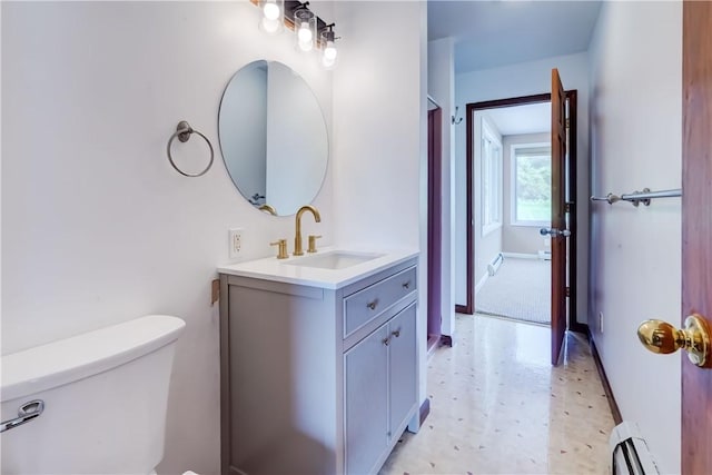 1566 Tracy Dr, Spafford, NY 13152 - half bathroom featuring a baseboard heating unit and vanity