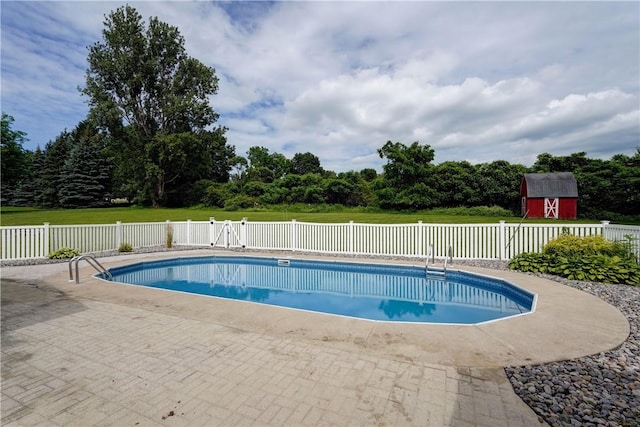 1566 Tracy Dr, Spafford, NY 13152 - view of swimming pool featuring a shed and a patio area