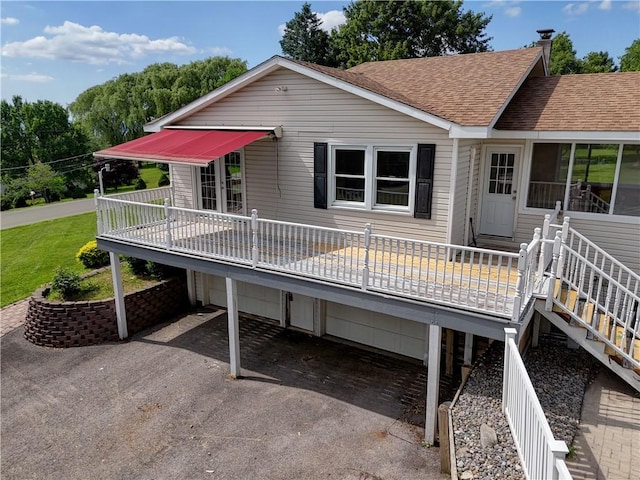 1566 Tracy Dr, Spafford, NY 13152 - rear view of property with roof with shingles and a deck