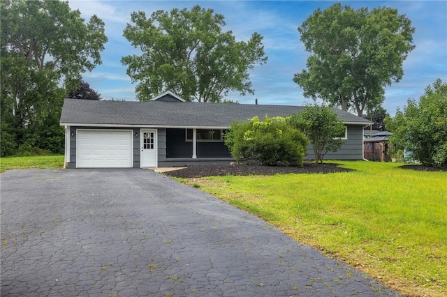 23 Kerry Park, Henrietta, NY 14534 - ranch-style home featuring an attached garage, a front yard, and asphalt driveway