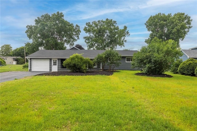 23 Kerry Park, Henrietta, NY 14534 - ranch-style house featuring a garage, asphalt driveway, and a front lawn