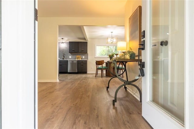 23 Kerry Park, Henrietta, NY 14534 - hall featuring light wood-type flooring and a chandelier