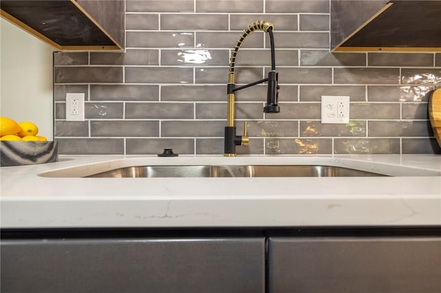 23 Kerry Park, Henrietta, NY 14534 - kitchen with decorative backsplash and light stone countertops