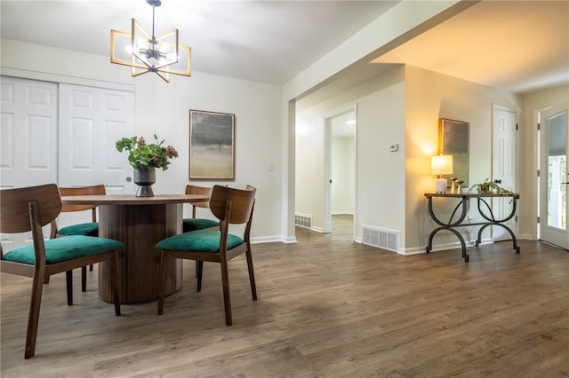 23 Kerry Park, Henrietta, NY 14534 - dining space with a chandelier and wood finished floors
