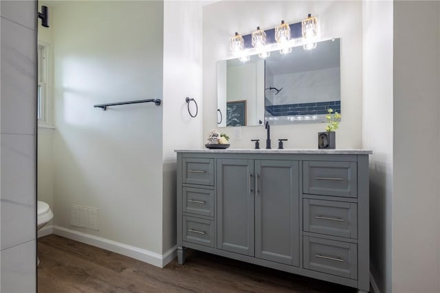 23 Kerry Park, Henrietta, NY 14534 - full bath featuring wood finished floors, vanity, and a shower