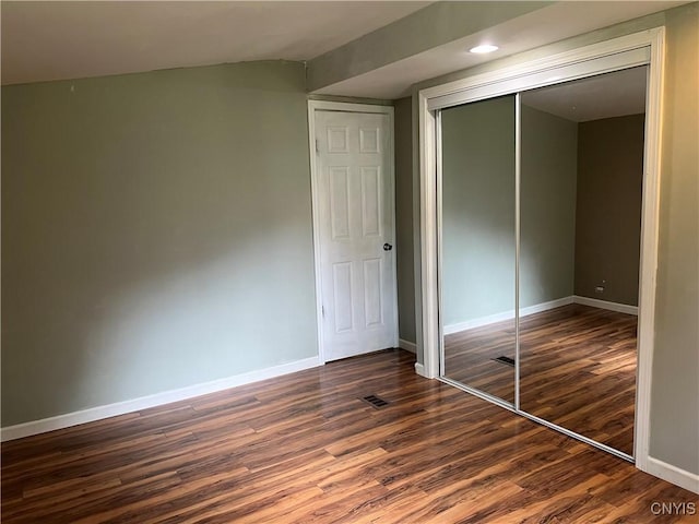 19 Beech Dr, Scriba, NY 13126 - unfurnished bedroom featuring dark wood-style flooring and a closet
